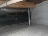 support jack installed in a crawl space