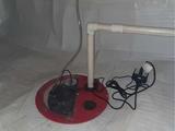 sump pump installed in an encapsulated crawl space