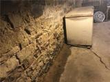 leaking basement with a fieldstone foundation