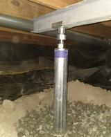 support jack installed in a crawl space