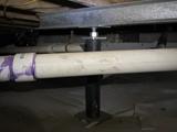 crawl space jack installed in a crawl space