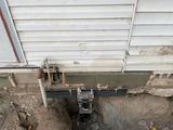 helical pier installed under house