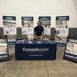 Groundworks New Haven employee at a company booth at the Path to the Parade 5K