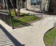 image of uneven concrete walkway needing trip hazard mitigation from Groundworks