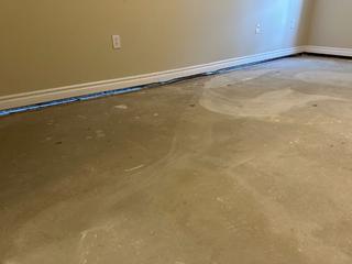 image of apartment floor before floor leveling from Groundworks