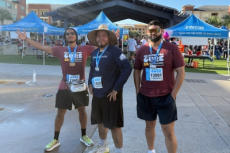 Three Groundworks team members at Houston's 13th Annual Head for the Cure 5K sponsorship