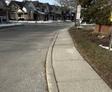 image of uneven sidewalks at condominium where Groundworks performed sidewalk leveling
