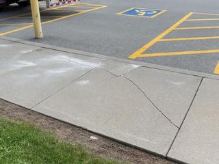 image of sunken concrete before Groundworks performed polyurethane injection concrete leveling to repair trip hazards