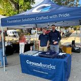 Two Groundworks team members at sponsorship booth at Dover's 41st Annual Apple Harvest Day 2025