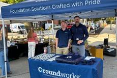 Two Groundworks team members at sponsorship booth at Dover's 41st Annual Apple Harvest Day 2025