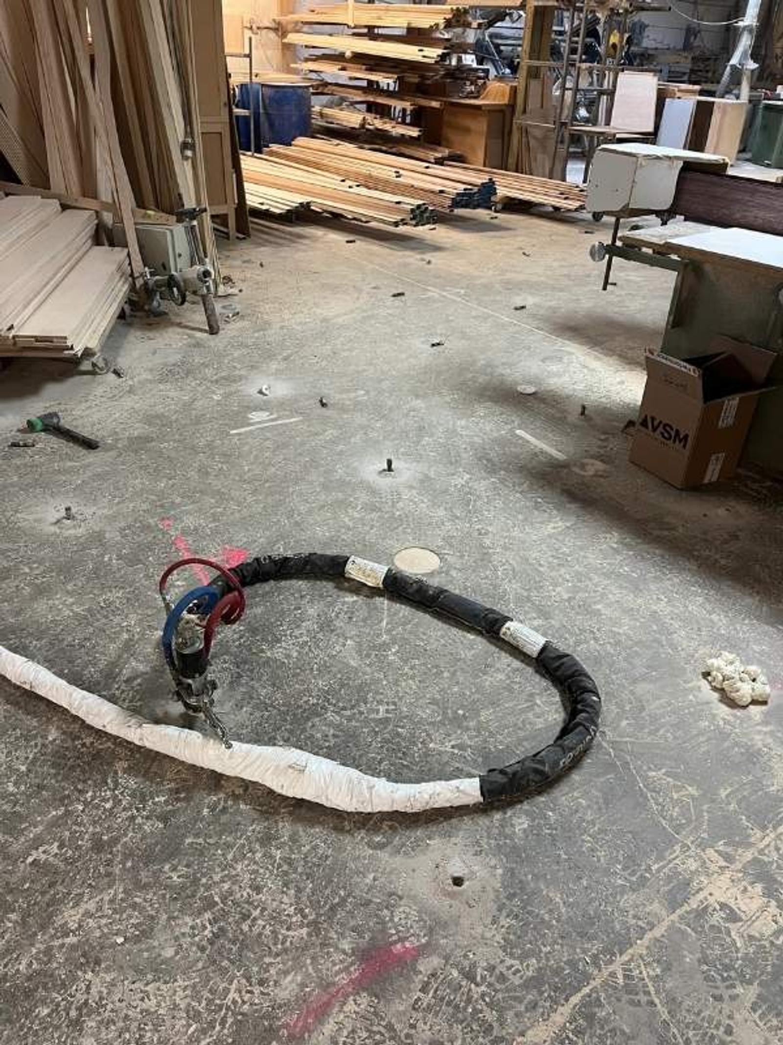 image during polyurethane injection to void fill from Groundworks