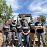 Groundworks' West Virginia employees stand together at a Habitat for Humanity build site