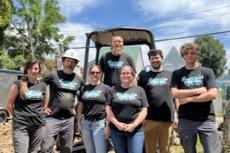 Groundworks' West Virginia employees stand together at a Habitat for Humanity build site