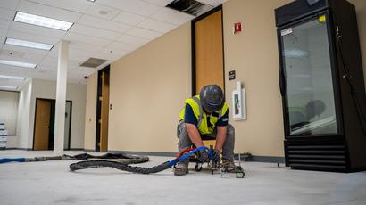 image of groundworks employee doing polyurethane injection