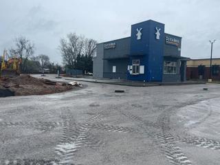 image of Dutch Bros Coffee shop after helical pier and grout curtain wall installation