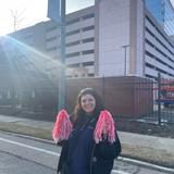 Groundworks team member holding pom poms at St. Jude Memphis Marathon Weekend sponsorship event