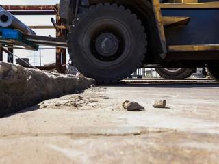 image of heavy machinery going over a rocking slab