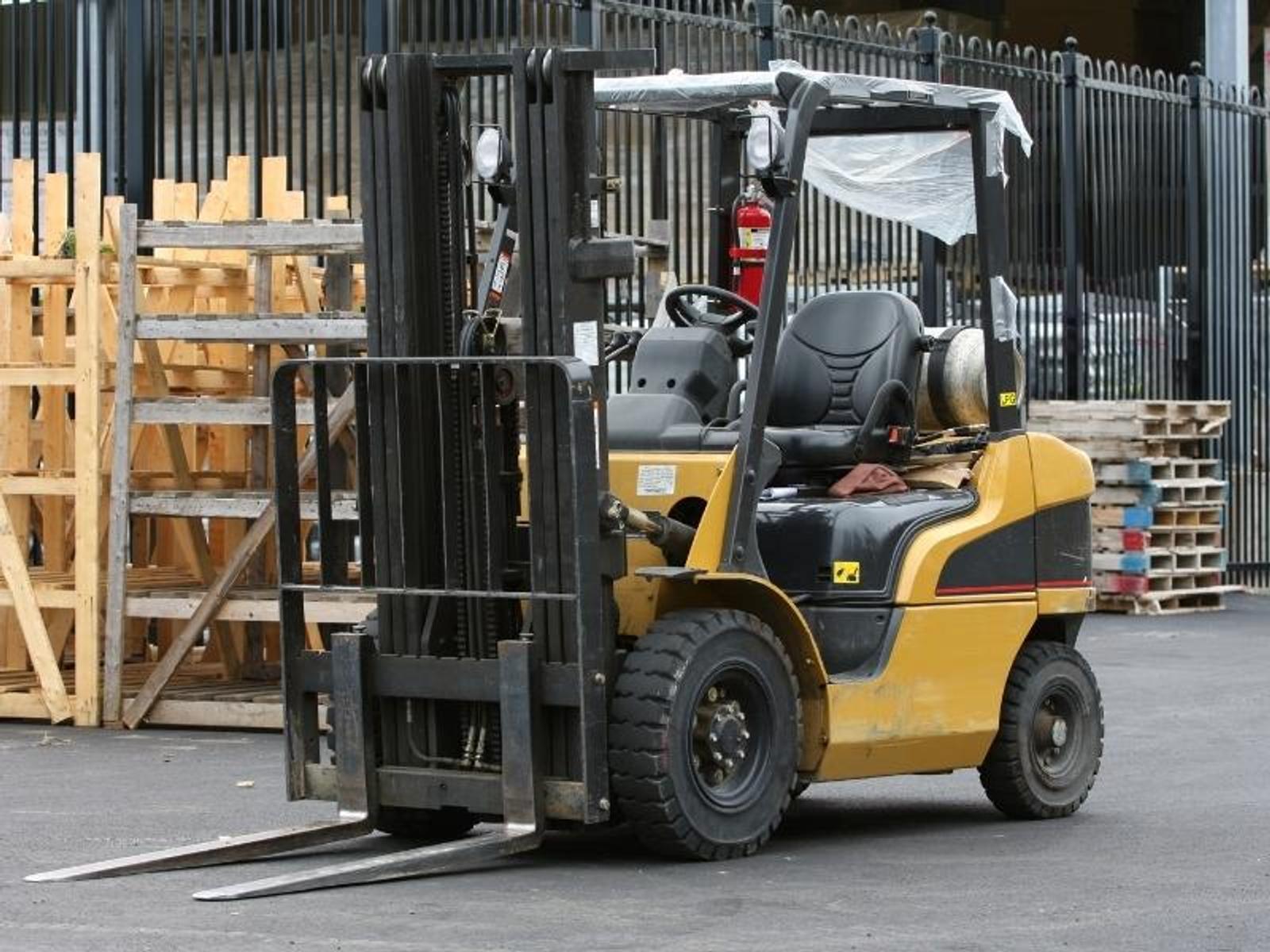 image of forklift on a concrete slab for Groundworks article "Preventing Forklift accidents with Rocking Slab Stabilization"