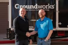 Matt Malone of Groundworks shaking hands with WTX owner.