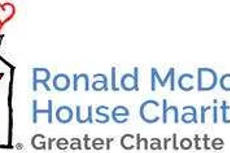 Ronald McDonald House Charities Greater Charlotte logo with a house, heart, and shaking hands.