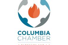 Columbia Chamber logo with an orange flame, blue and gray shapes, and the slogan "Partners for a Greater Columbia.