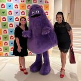 Groundworks team members with McDonalds mascot at Red Shoe Affair sponsorship event