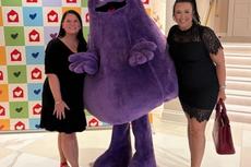 Groundworks team members with McDonalds mascot at Red Shoe Affair sponsorship event