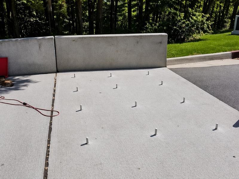image of injection ports placed to inject polyurethane for void filling and bridge transition slab lifting