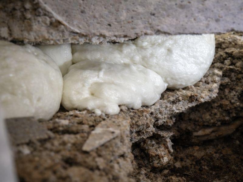 image of polyurethane foam beneath floor slabs during floor slab lifting project from Groundworks