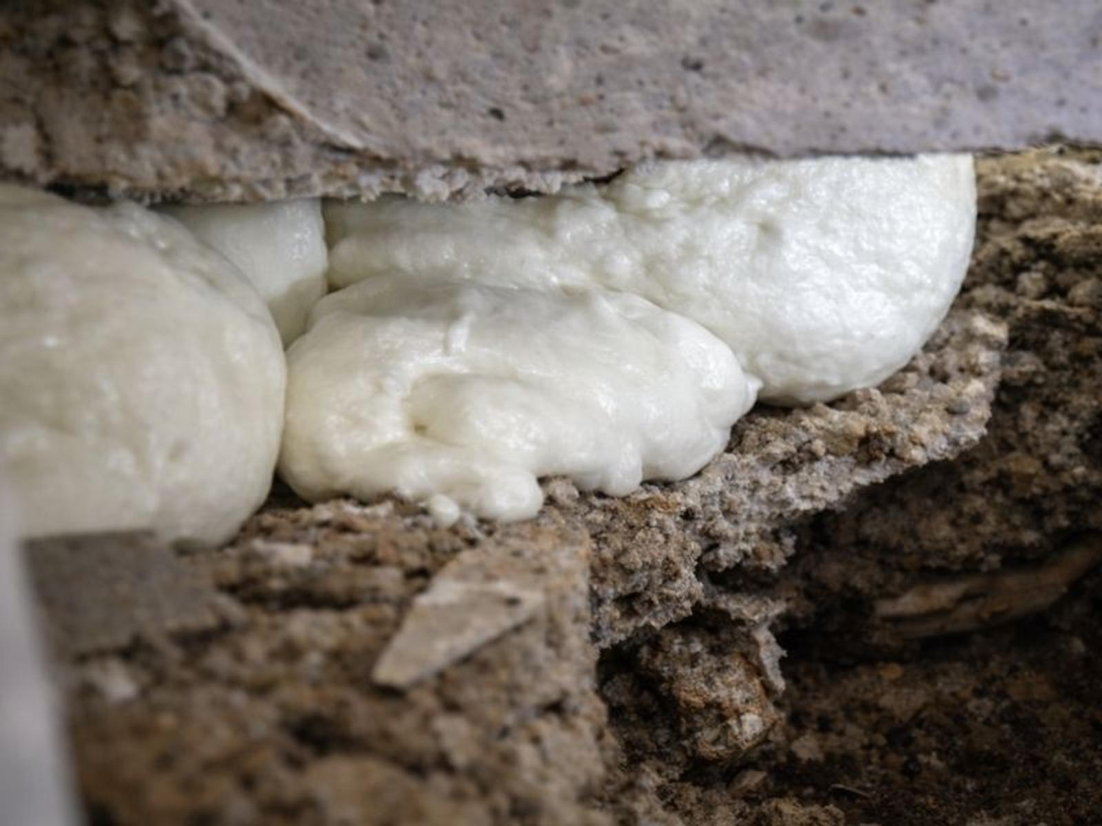 image of polyurethane foam beneath floor slabs during floor slab lifting project from Groundworks