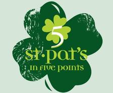 Green four-leaf clover with "5 st. pat's in five points" written in yellow and green text.