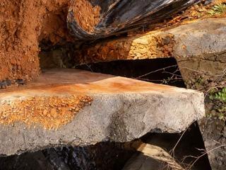 image of compromised wing walls adjacent to triple box culvert