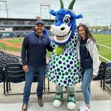 Groundworks New Haven employees with a mascot at a Hartford Yard Goats baseball game