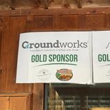 a Groundworks Pittsburgh sponsorship banner on display at the Log Cabin Cares Sporting Clay Benefit