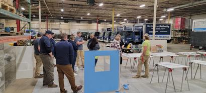 OBA staff training in warehouse