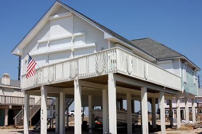 Galveston Texas house on tall wooden stilts