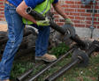 Crew picking up helical pier