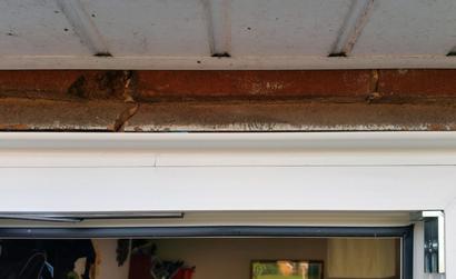Gap in window frame due to foundation settling. Leads to sticking doors and windows