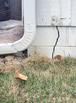 large crack in block foundation of home
