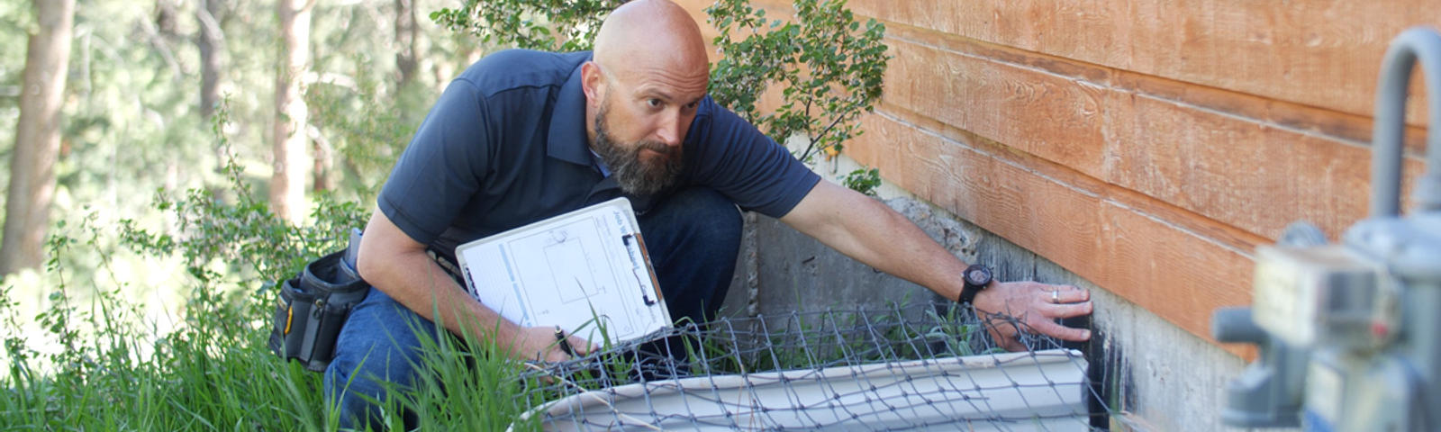 CFI inspecting home foundation