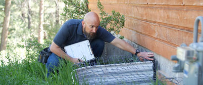 CFI inspecting home foundation