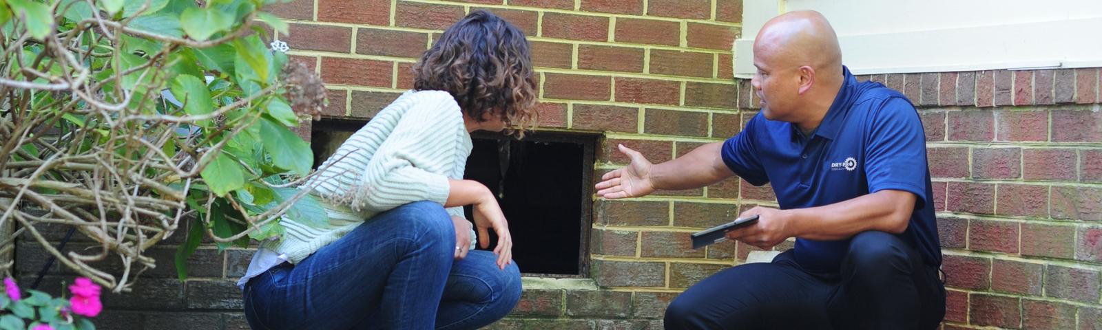 DryPro CFI showing crawl space to customer - Desktop Hero