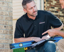 Certified Field Inspector with homeowner