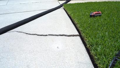 Cracked concrete driveway