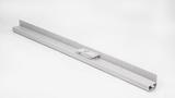 A long, silver metal track with a small square component mounted in the center, against a white background.