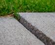 unlevel concrete sidewalk