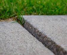 unlevel concrete sidewalk