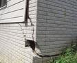 Severely cracked foundation on the exterior of the home