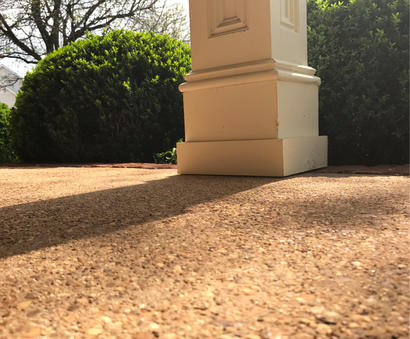 concrete driveway pillar after lifting large