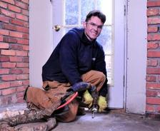 Man injecting PolyRenewal into concrete